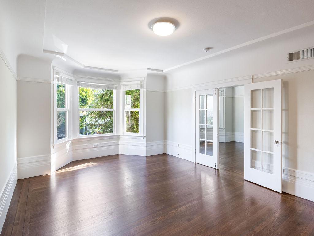 empty room with wood floors