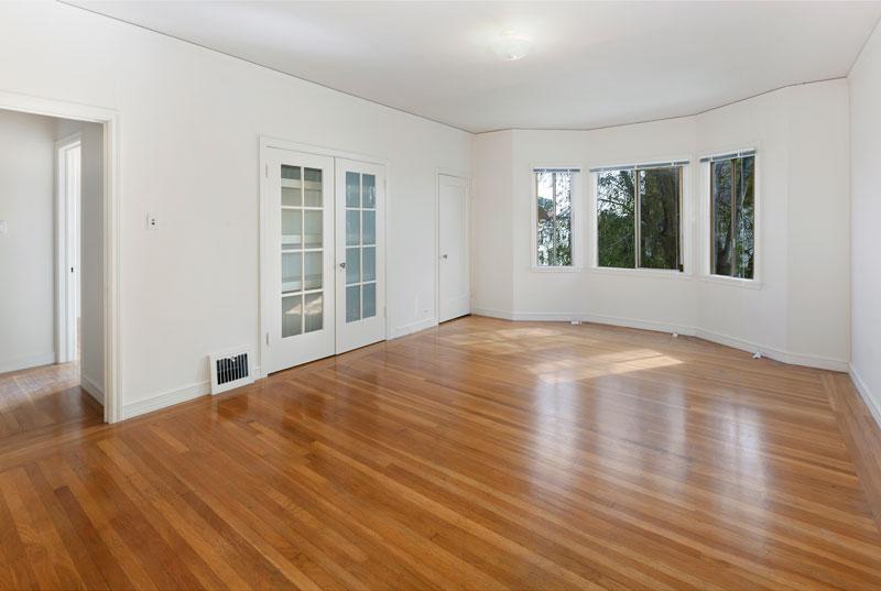 Empty room with wood floors